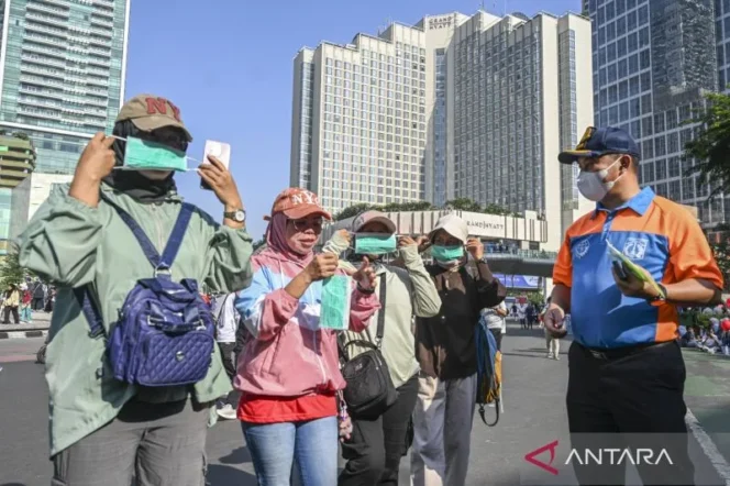 
					Hadapi Sebaran Abu Vulkanik Anak Krakatau, Gubernur DKI Minta Warga Terapkan Protokol 5M
