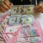 Rupiah Ditutup Melemah ke Rp17.530 per Dolar AS Akibat Tekanan Harga Minyak