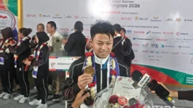 Lifter Rahmat Erwin Abdullah Persembahkan Medali Emas Asian Games untuk Keluarga